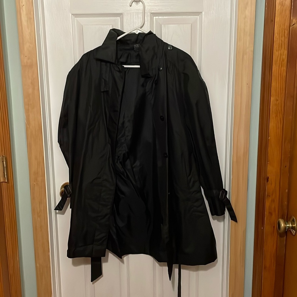 Women’s black trench coats. C3C